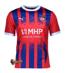 Heidenheim - 2024/2025 - Jersey Heidenheim - Uniform Heidenheim - Puma Heidenheim - Diseño moderno - Blue - Gray - White - Bundesliga - Copa de Germany - Home kit - Away kit - Patrón gráfico - Identidad del club - Gola redonda - Escudo del club - Logo de Puma - Sponsor Intersport - Tecnologías innovadoras - Confort - Rendimiento.