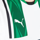 Borussia Mönchengladbach - 2024-2025 - Jersey Borussia Mönchengladbach - Uniform Borussia Mönchengladbach - Puma Borussia Mönchengladbach - Diseño moderno - Black - White - Green - Red - Bundesliga - Copa de Germany - Champions League - Away kit - Patrón gráfico - Identidad del club - Gola redonda - Escudo del club - Logo de Puma - Sponsor Postbank - Tecnologías innovadoras - Confort - Rendimiento.