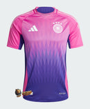 Germany - 2024/2025 - Jersey Germany - Uniform alternate Germany - Adidas Germany - Diseño innovador - Magenta - Euro - Selección Alemana - Gola redonda - Escudo de la DFB - Logotipo de Adidas - Pants purple - Socks morados - Degradado a purple - World Cup de 1994 - Tecnologías innovadoras - Confort - Rendimiento - Identidad - Historia - Águila.