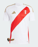 Peru 2024/2025 - Jersey Peru - Uniform home Peru - Adidas Peru - White - Diseño clásico - Copa América - World Cup Qualifiers - Red - Blue - Tradición peruana - Banda red - Gola redonda - Pants azules - Socks blancas - Innovación - Tecnología de vanguardia - Comodidad - Rendimiento.