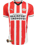 PSV 2024/2025 - Jersey PSV - Uniform home PSV - Puma PSV - Eredivisie - Diseño clásico - Diseño moderno - Red - White - Gola redonda - Escudo del PSV - Logo de Puma - Historia del club - Innovación de Puma - Tecnologías innovadoras - Confort - Rendimiento.