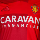Real Zaragoza 2024/2025 - Jersey away Real Zaragoza - Adidas - Red - Dos tonos - Emblema Adidas - 3 rayas - Jersey "tomate" - Historia del club - Temporada - Fútbol - Estilo - Equipamiento deportivo.